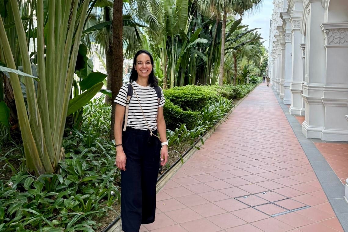Angela von Au on a palm-lined path in Singapore